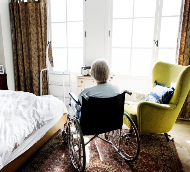 nursing home resident in wheelchair 0