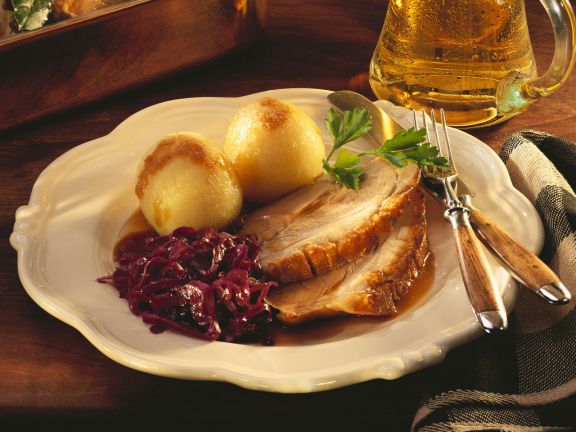 roast pork with potato dumplings and cabbage 533870
